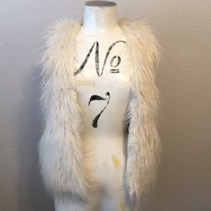 White faux fur vest